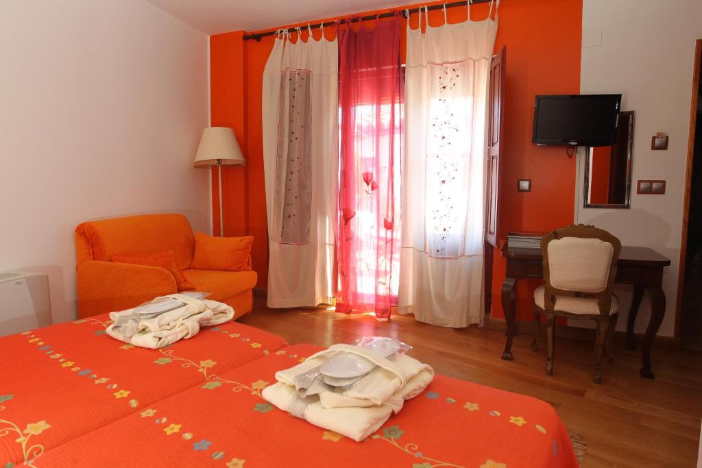 Postel nebo postele na pokoji v ubytování Posada Real La Mula de los Arribes