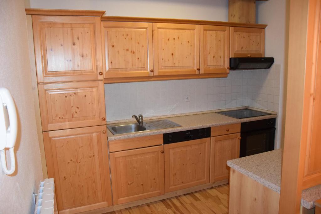 Kuchyň nebo kuchyňský kout v ubytování Holiday Apartment Bolfenk