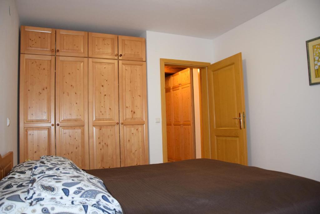 Postel nebo postele na pokoji v ubytování Holiday Apartment Bolfenk