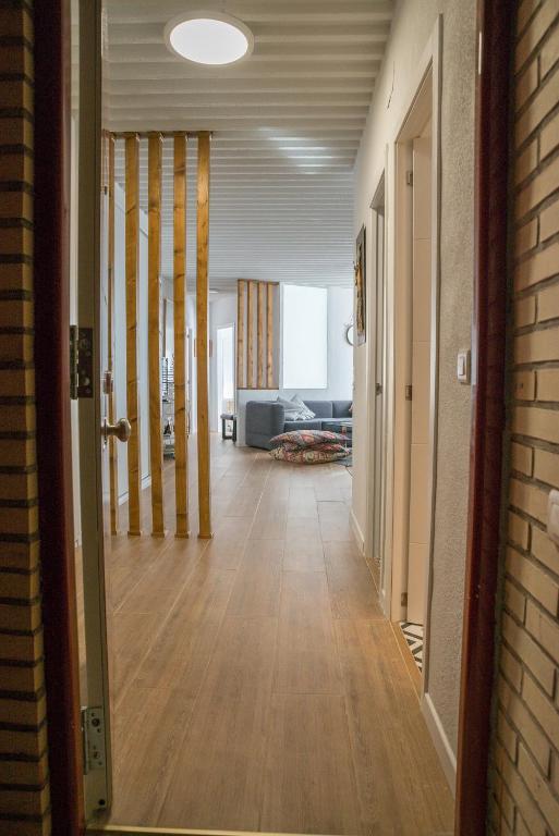 Łóżko lub łóżka w pokoju w obiekcie Gran Apartamento En Sierra Nevada