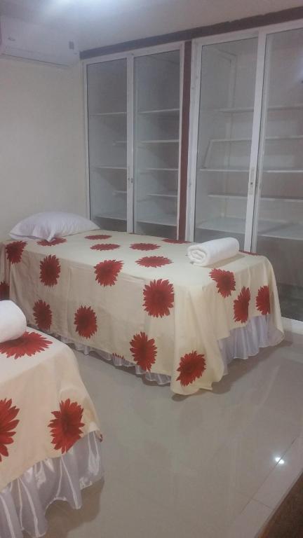 Postel nebo postele na pokoji v ubytování Hostel Quintonido