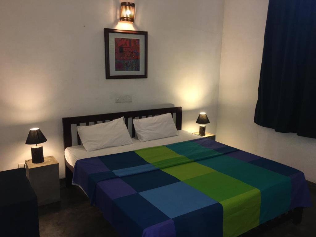 Postel nebo postele na pokoji v ubytování Colombo Beach Hostel