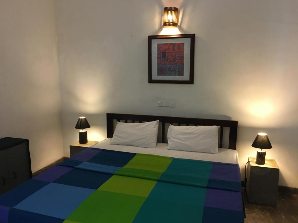 Postel nebo postele na pokoji v ubytování Colombo Beach Hostel