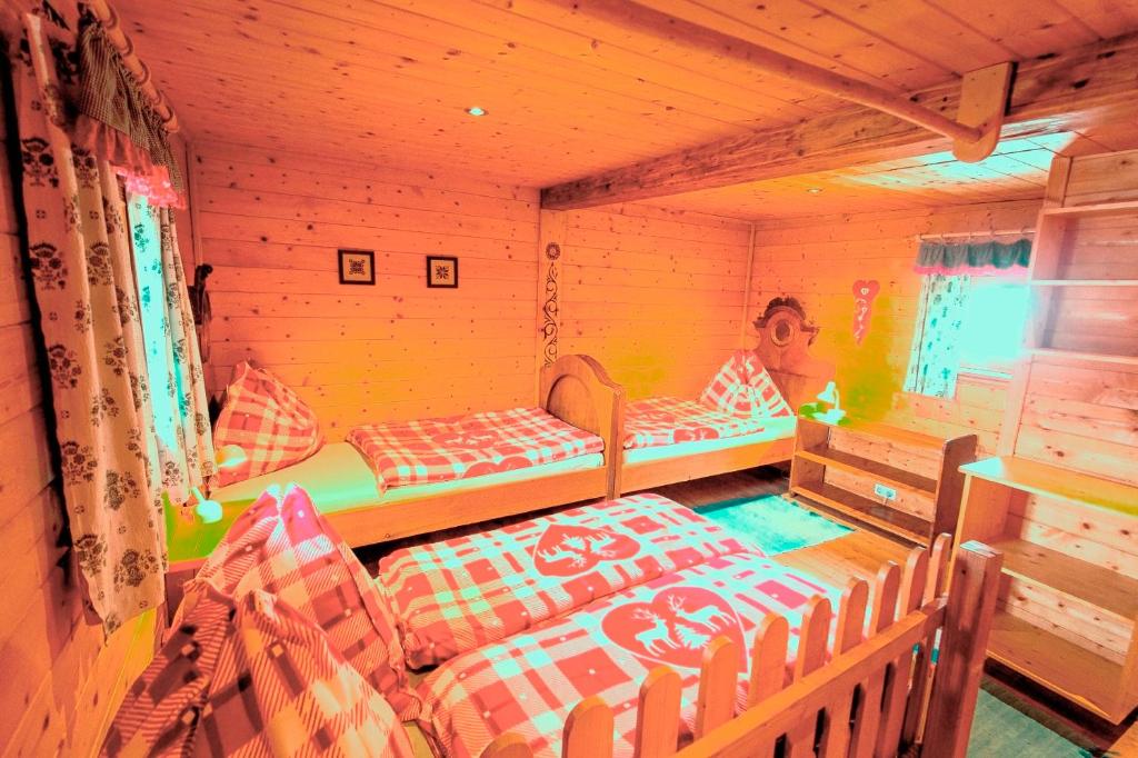 Postel nebo postele na pokoji v ubytování Chalet "Knusperhäuschen"