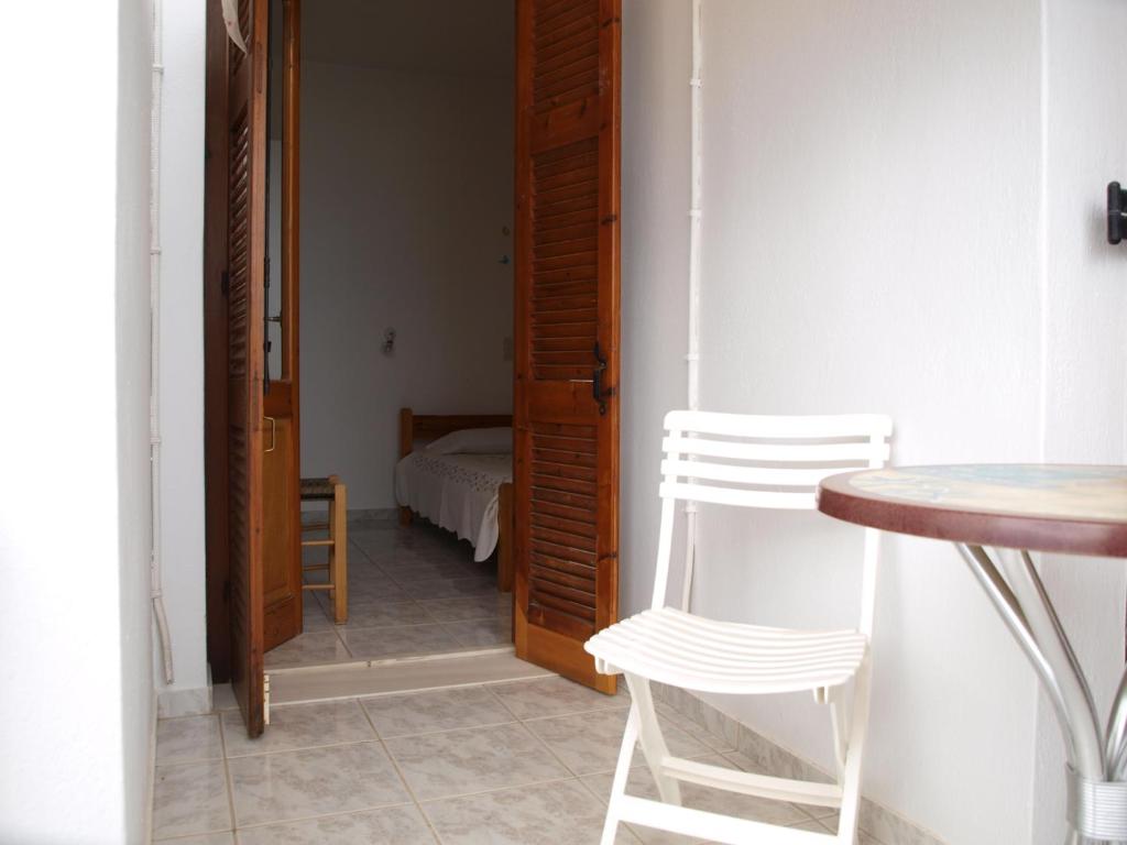 Postel nebo postele na pokoji v ubytování Batika Rooms