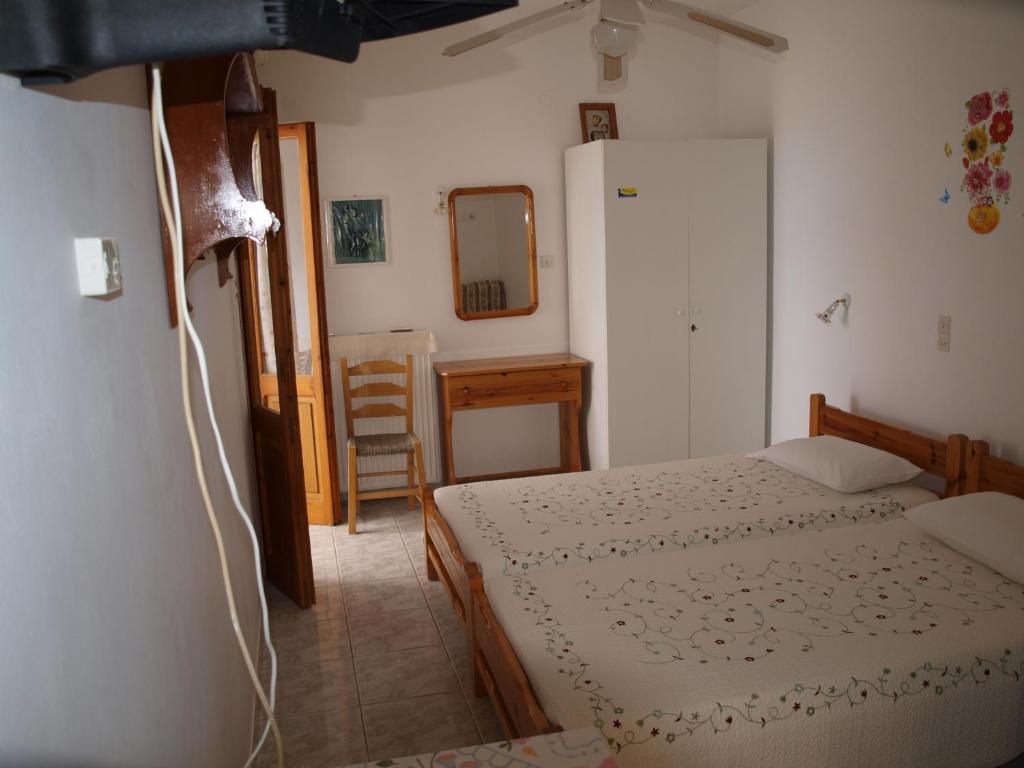 Postel nebo postele na pokoji v ubytování Batika Rooms