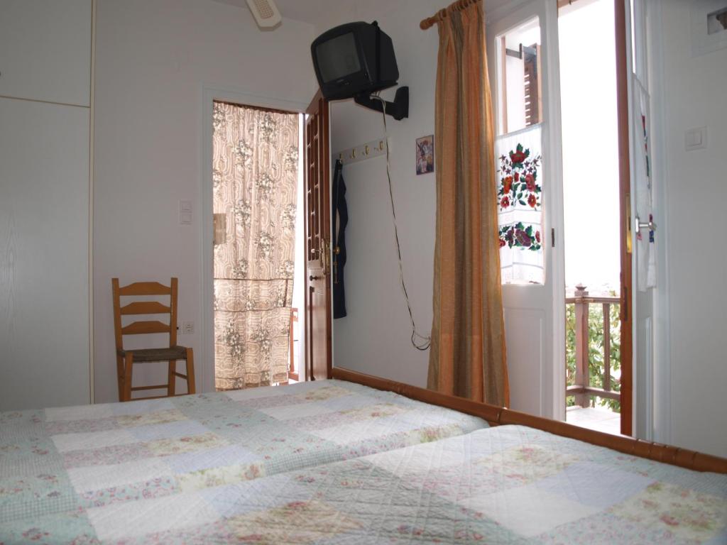 Postel nebo postele na pokoji v ubytování Batika Rooms