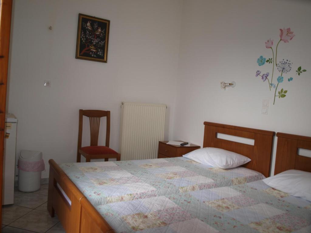 Postel nebo postele na pokoji v ubytování Batika Rooms