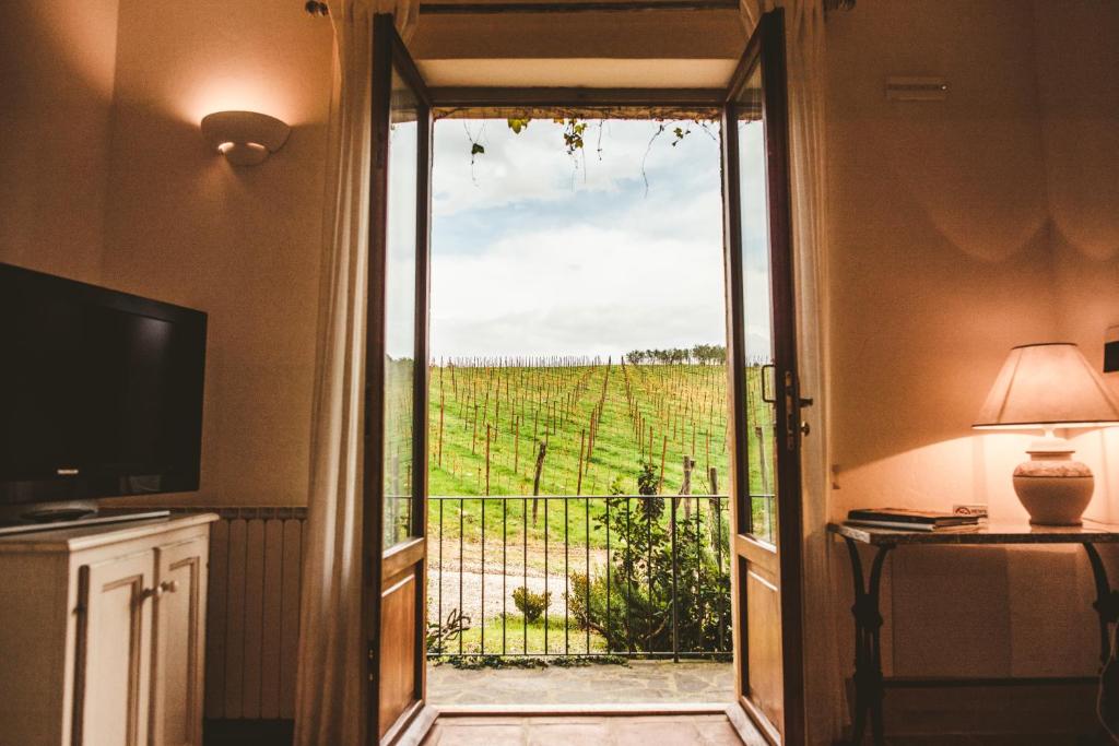 A television and/or entertainment centre at Fattoria Di Corsignano