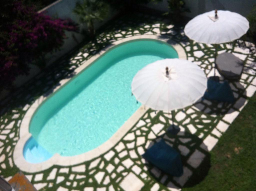 A view of the pool at Casa Magnani sardegna or nearby