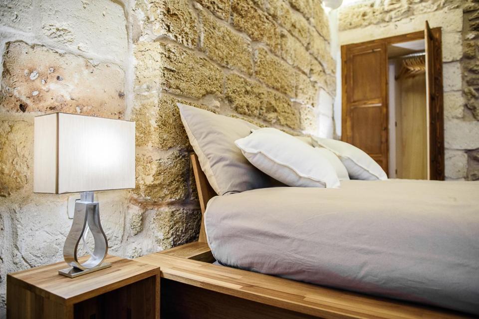 Postel nebo postele na pokoji v ubytování Sacratum B&B Suite Spa