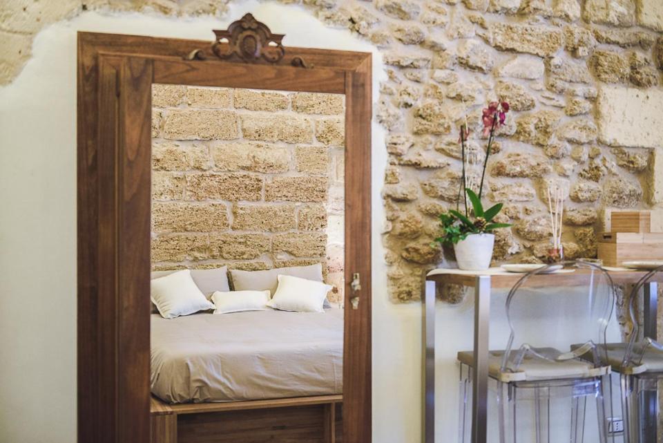 Postel nebo postele na pokoji v ubytování Sacratum B&B Suite Spa