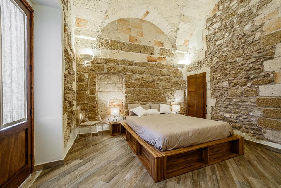 Postel nebo postele na pokoji v ubytování Sacratum B&B Suite Spa