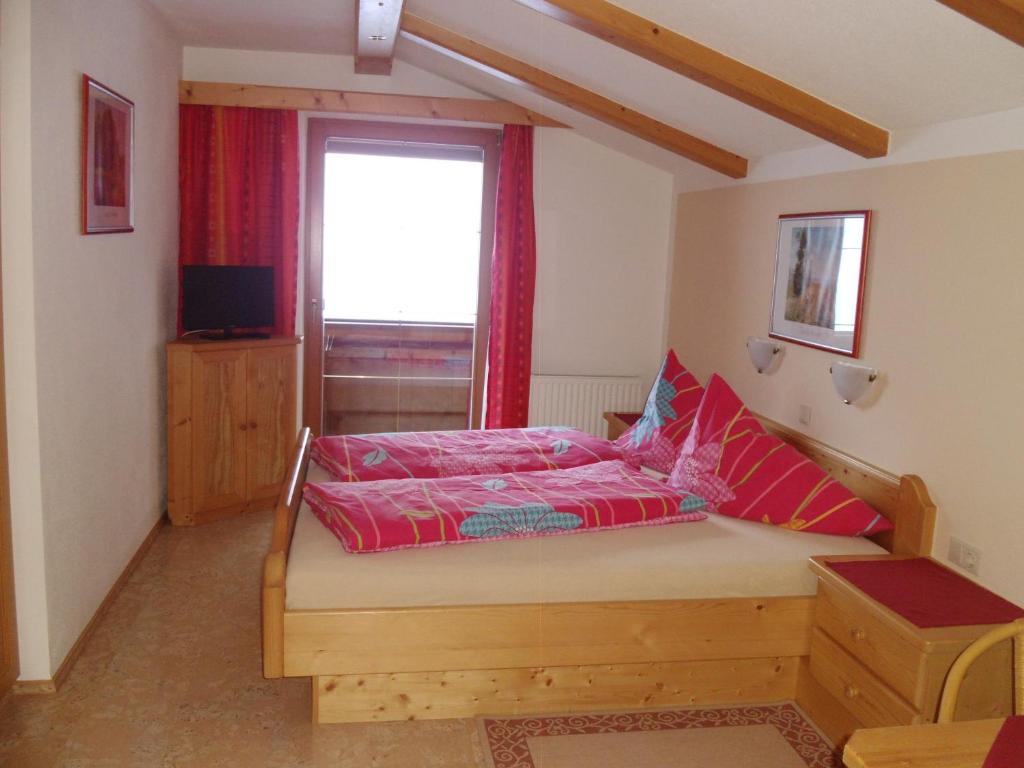 Postel nebo postele na pokoji v ubytování Ferienwohnung Hörbiger