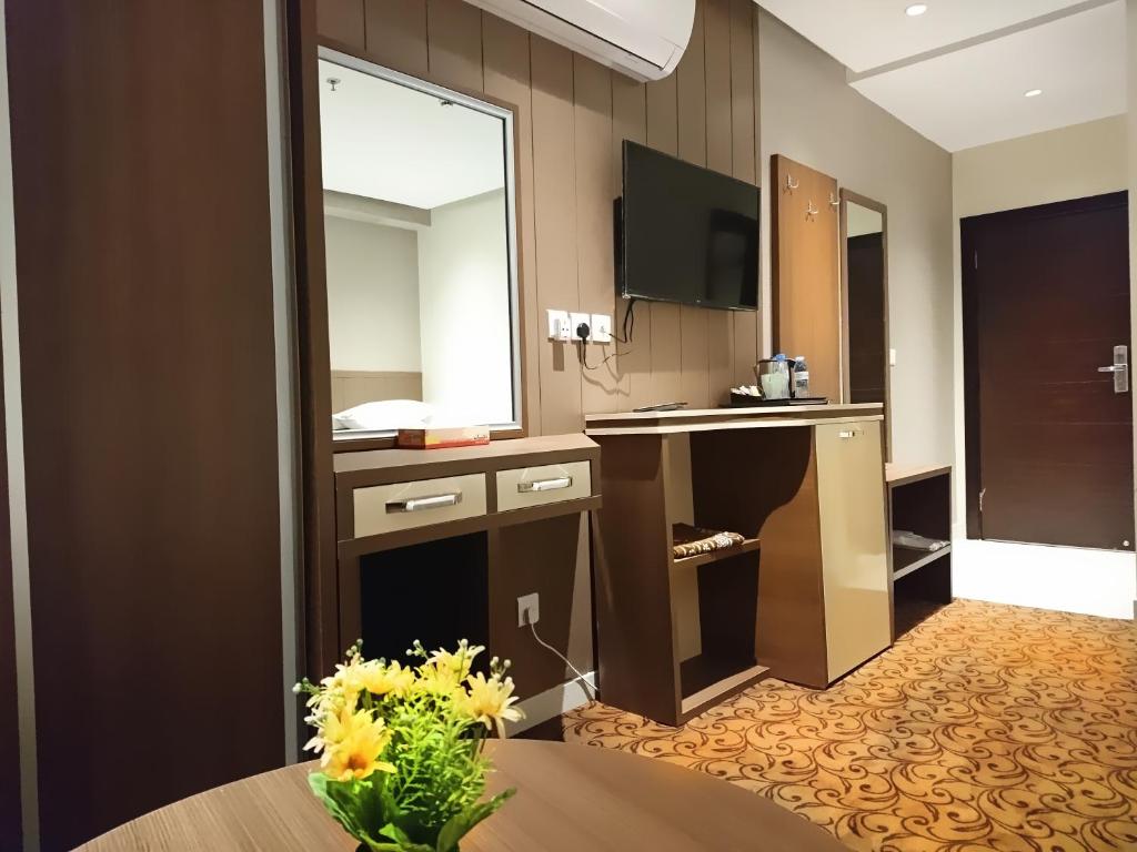 TV a/nebo společenská místnost v ubytování Batoul Ajyad Hotel
