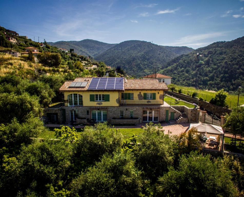 a house with solar panels on top of it at Ca' Belvedere in Seborga