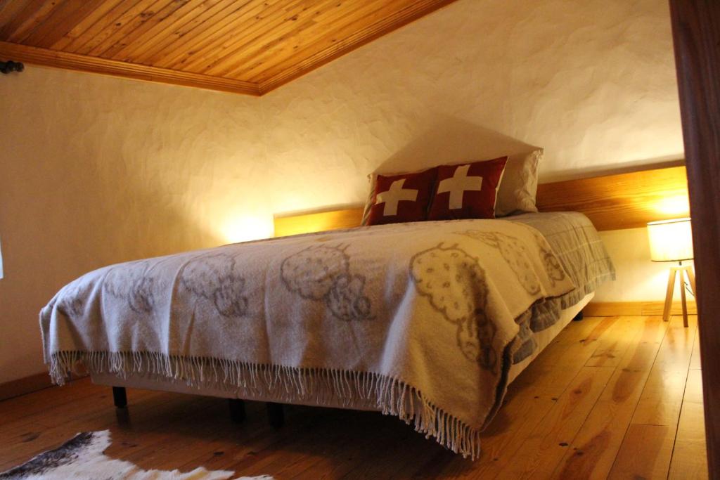 Postel nebo postele na pokoji v ubytování Casa do Tio João