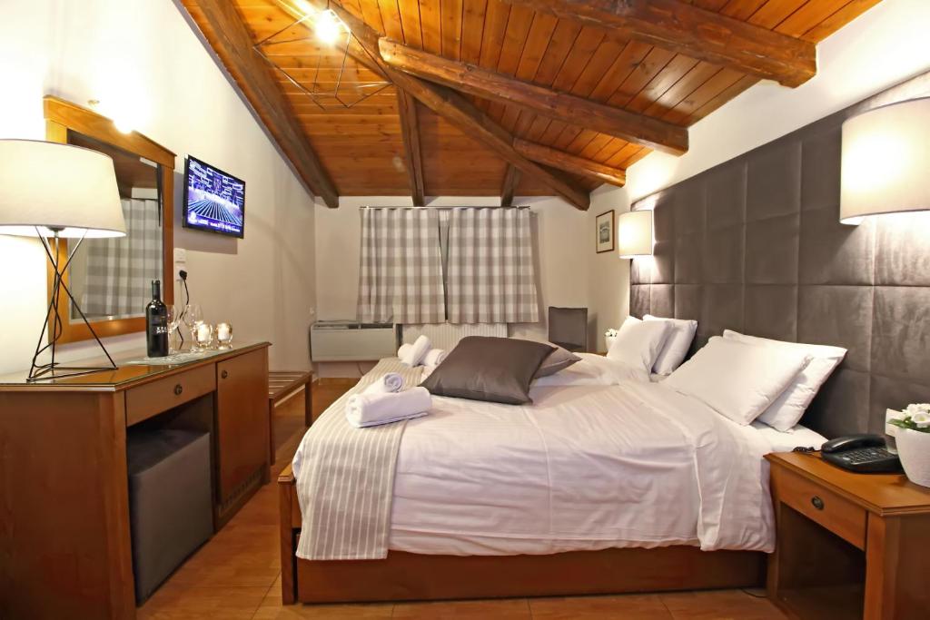 Uma cama ou camas num quarto em Arion Hotel