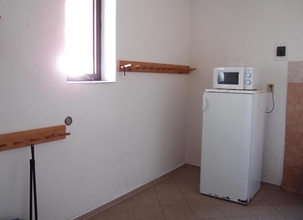 Kuchyň nebo kuchyňský kout v ubytování Penzion, apartmany Florian