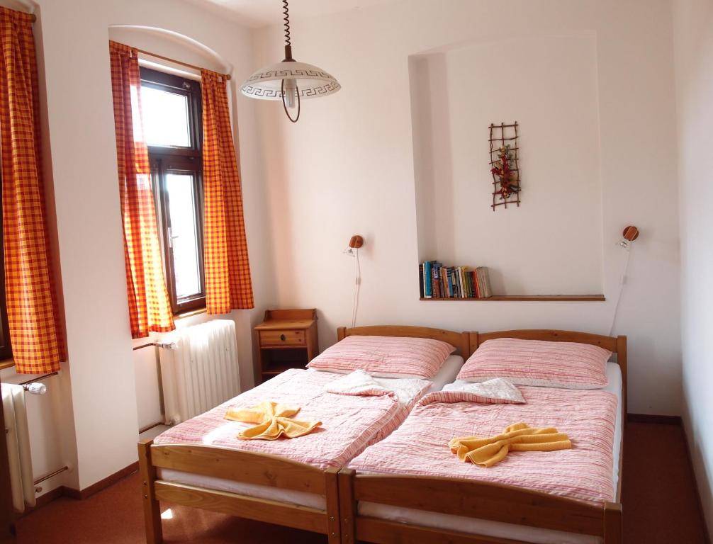 Postel nebo postele na pokoji v ubytování Penzion, apartmany Florian