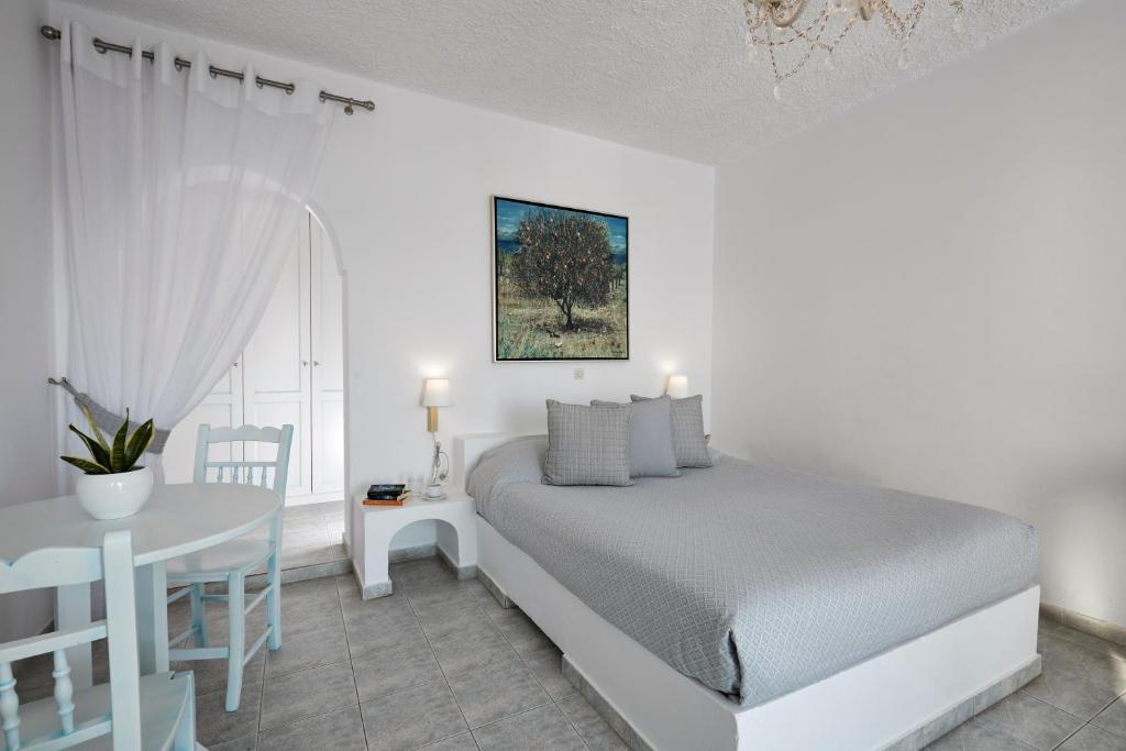 Postel nebo postele na pokoji v ubytování Andromeda Villas & Spa Resort