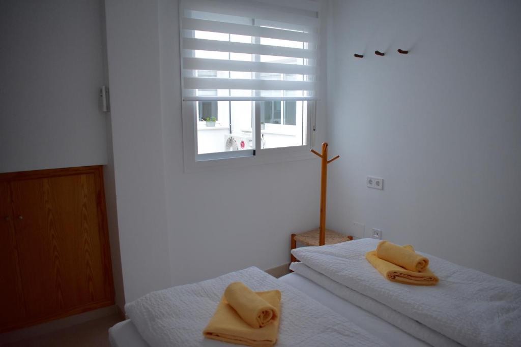 Posteľ alebo postele v izbe v ubytovaní Casa Al Sur Apartments