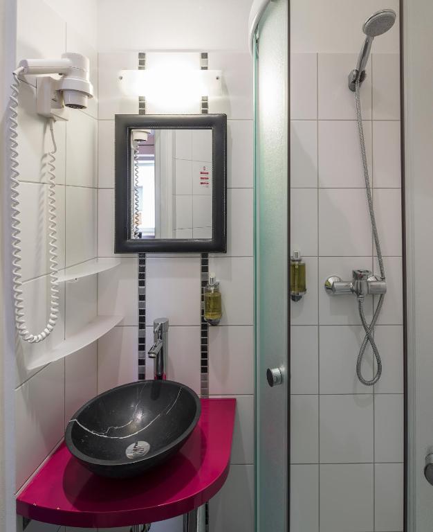 Vannas istaba naktsmītnē Dodo Hotel