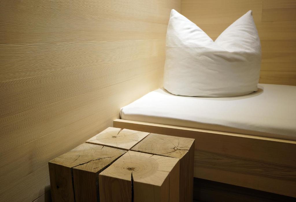 Postel nebo postele na pokoji v ubytování Gästehaus Meusburger