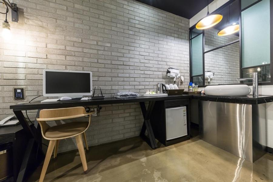 Kuchyň nebo kuchyňský kout v ubytování Anyang Boutique Hotel AMA
