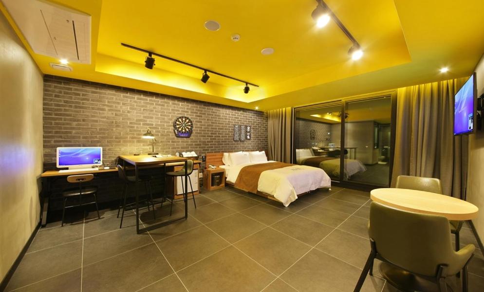 TV a/nebo společenská místnost v ubytování Anyang Boutique Hotel AMA