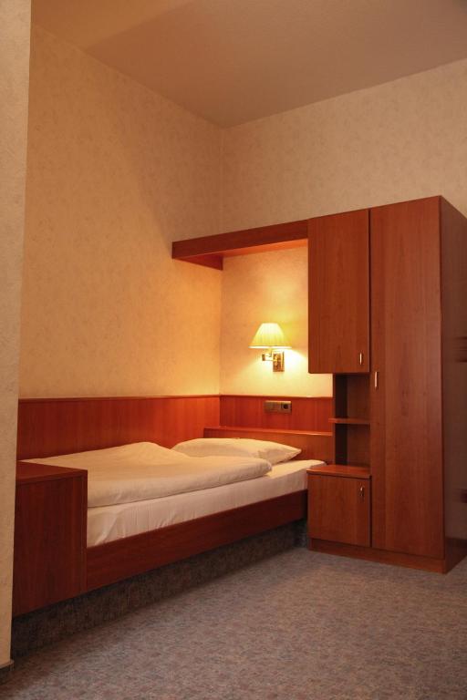 Postel nebo postele na pokoji v ubytování Ackfeld Hotel-Restaurant