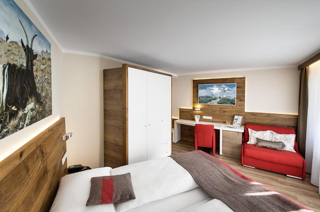 Postel nebo postele na pokoji v ubytování Hotel Butterfly