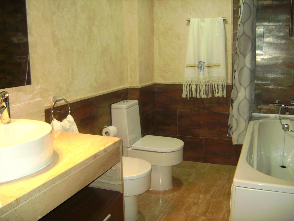 Koupelna v ubytování Duplex primera línea de mar