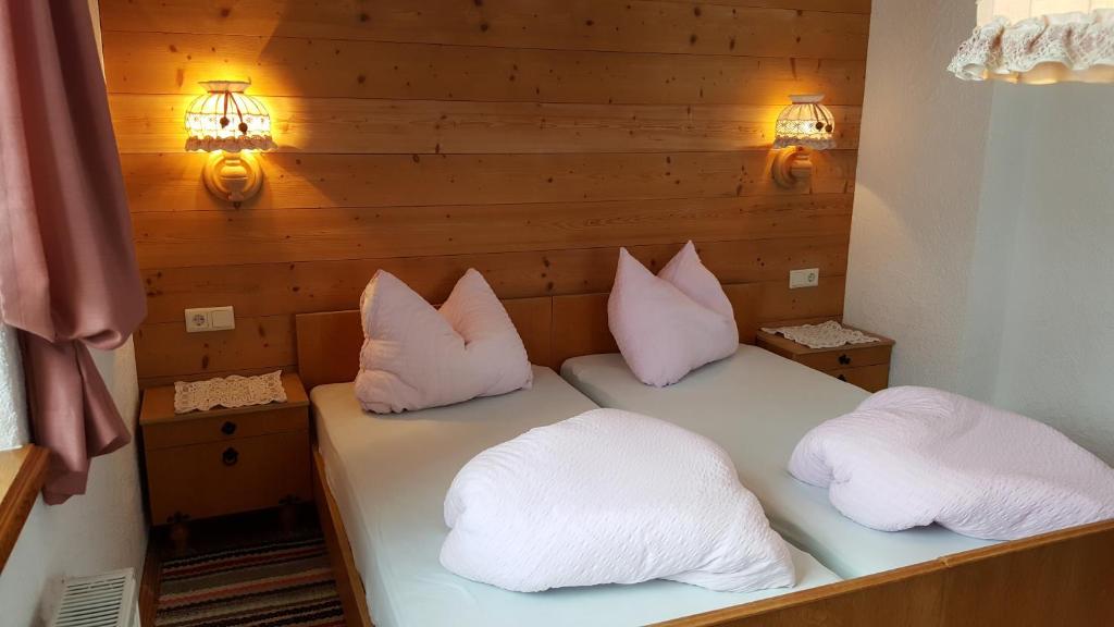 Posteľ alebo postele v izbe v ubytovaní Bio-Berghof