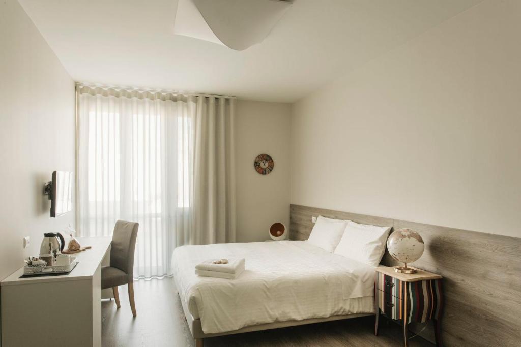 Postel nebo postele na pokoji v ubytování Livingstone B&B