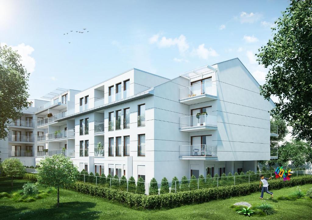 Vonkajšia záhrada v ubytovaní Chopin Apartments