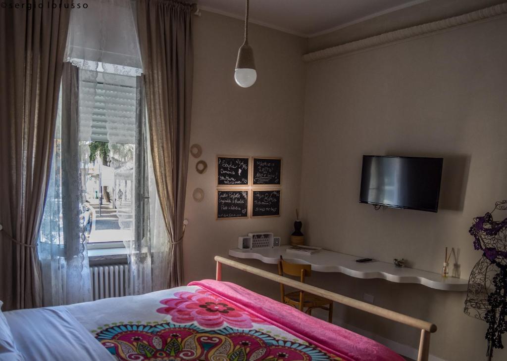 Postel nebo postele na pokoji v ubytování Leucos