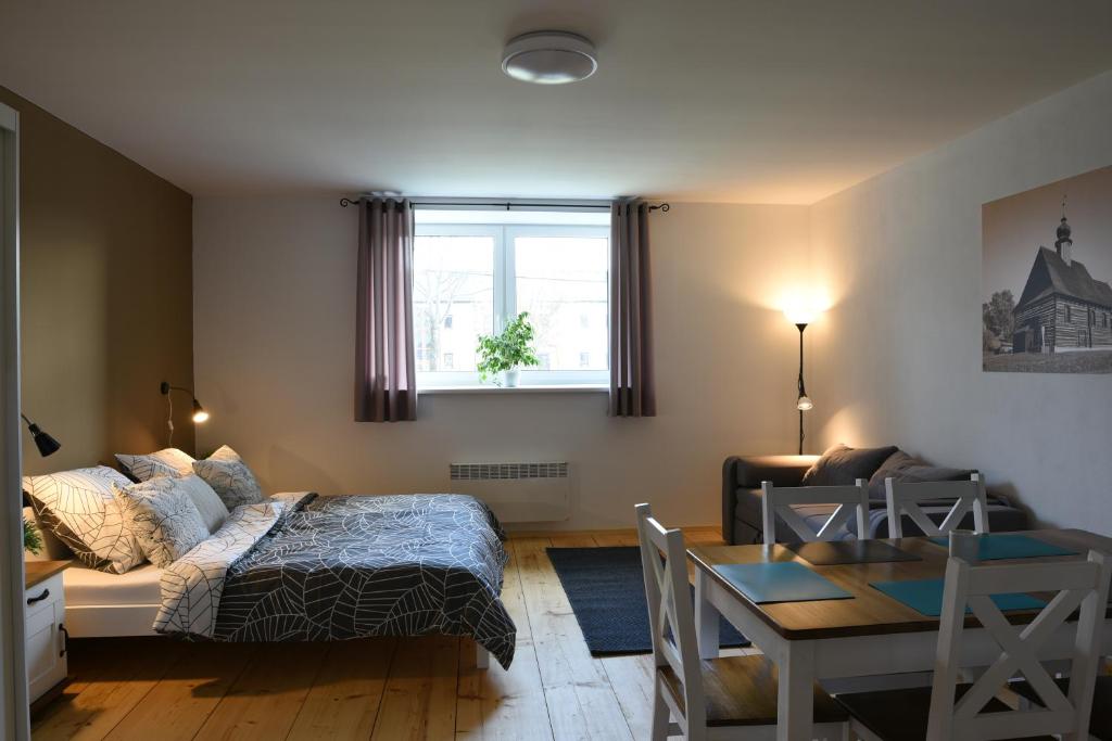 Postel nebo postele na pokoji v ubytování Apartmány Vízmberk