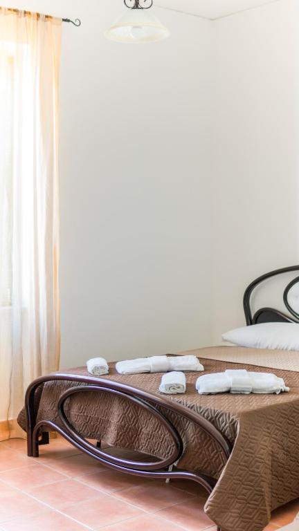 Postel nebo postele na pokoji v ubytování B&B Afrodite