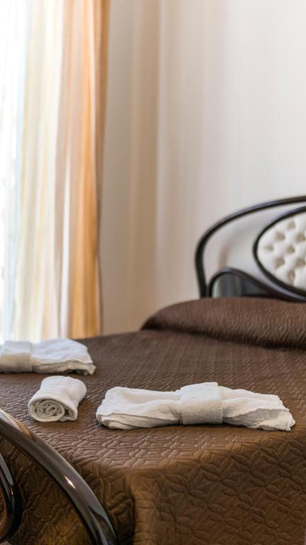 Postel nebo postele na pokoji v ubytování B&B Afrodite