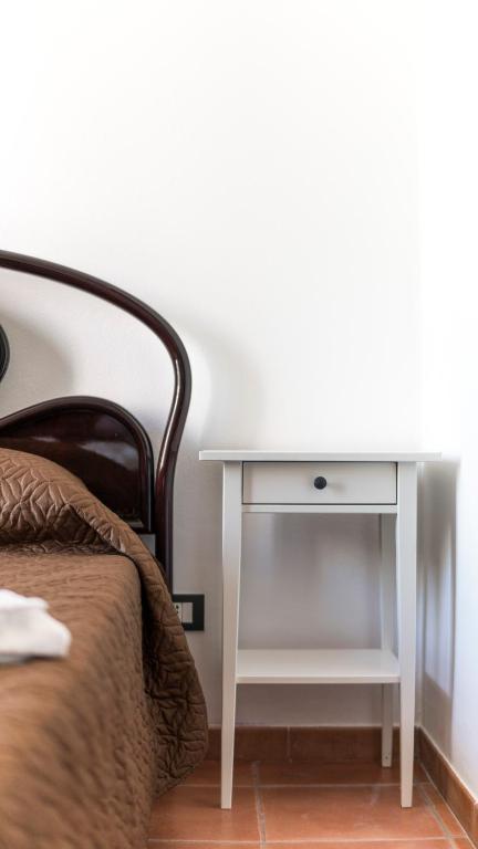 Postel nebo postele na pokoji v ubytování B&B Afrodite