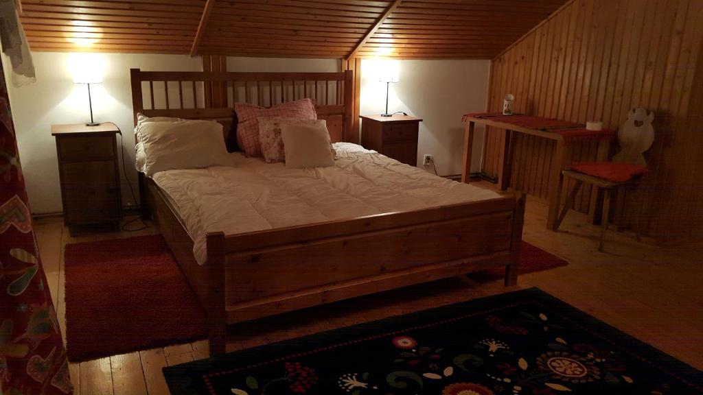 Postel nebo postele na pokoji v ubytování Ptaszorowka