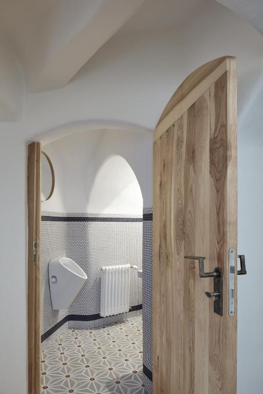 Łóżko lub łóżka w pokoju w obiekcie Štajnhaus