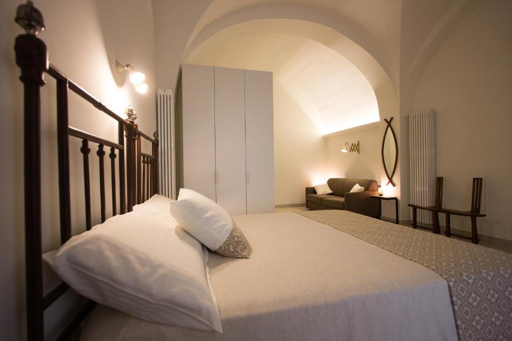 Postel nebo postele na pokoji v ubytování Ai Sottani B&B Deluxe Suite