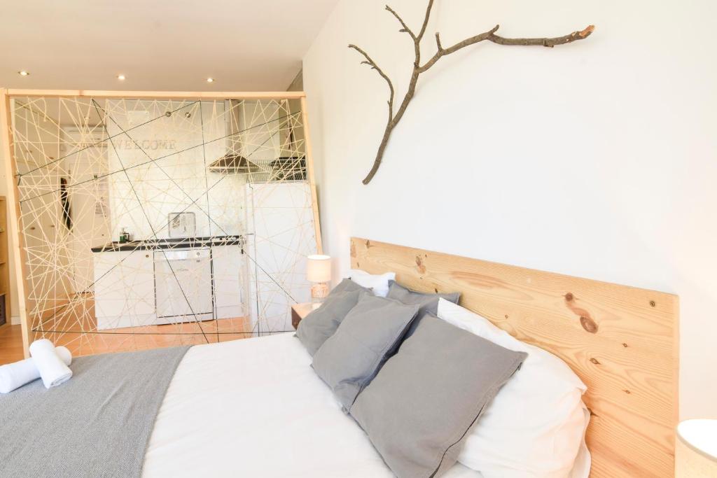 Posteľ alebo postele v izbe v ubytovaní P&P Apartament Lagunillas I y II