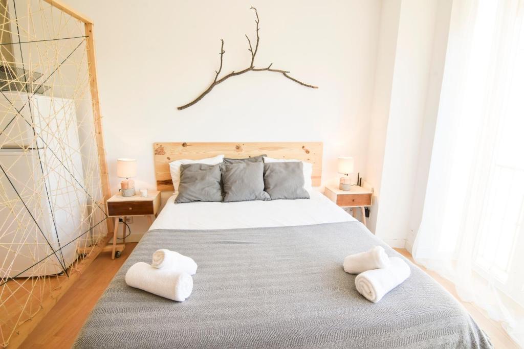 Posteľ alebo postele v izbe v ubytovaní P&P Apartament Lagunillas I y II