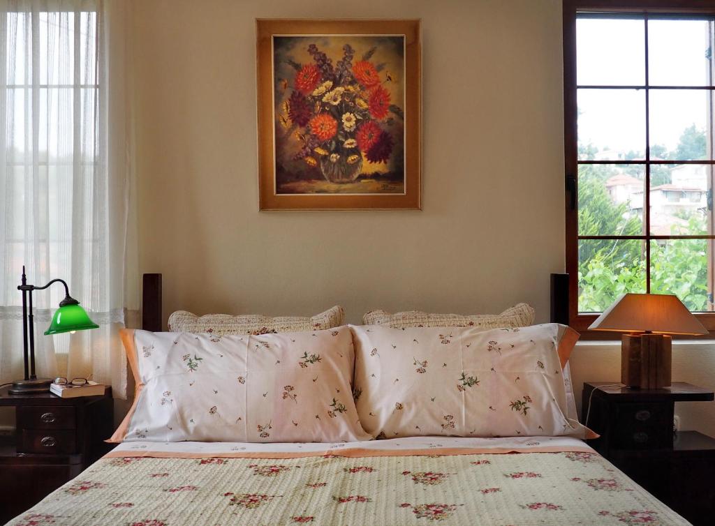 Postel nebo postele na pokoji v ubytování Paliouri House