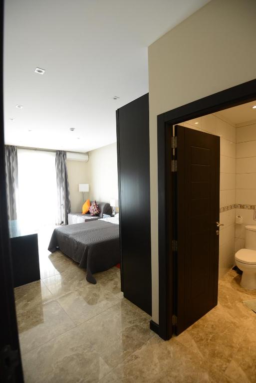 Postel nebo postele na pokoji v ubytování Il-Bukkett B&B
