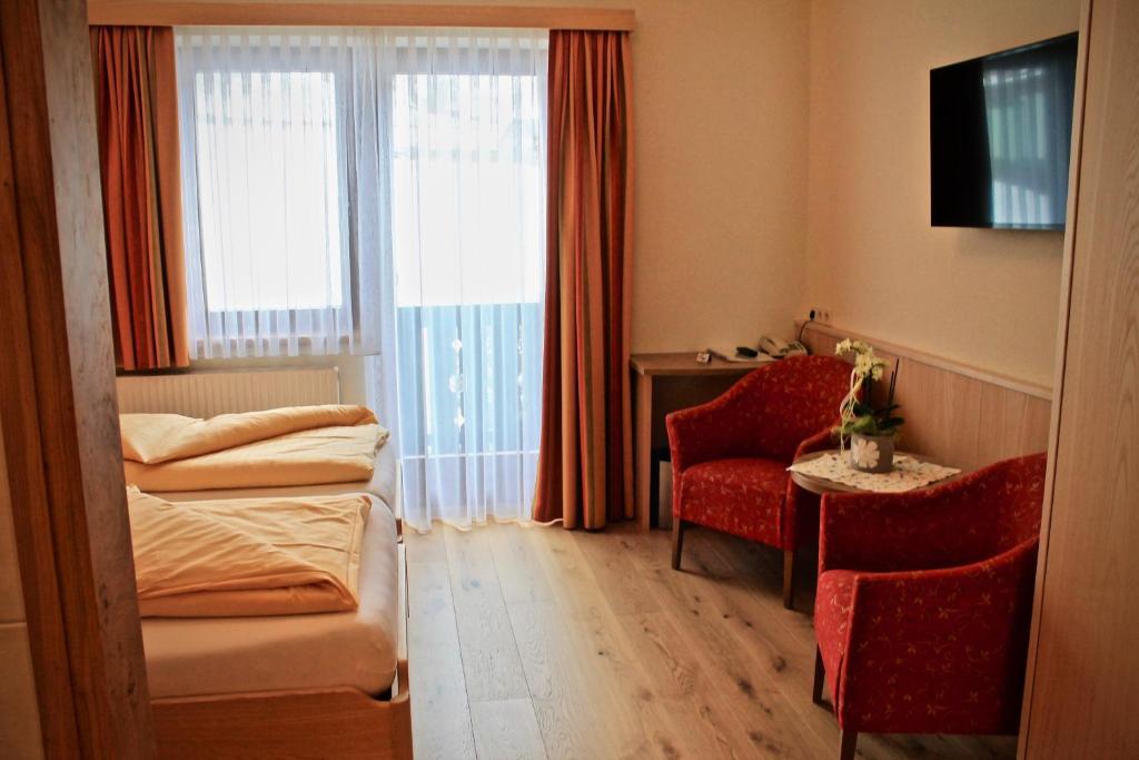 Postel nebo postele na pokoji v ubytování Hotel Druschhof