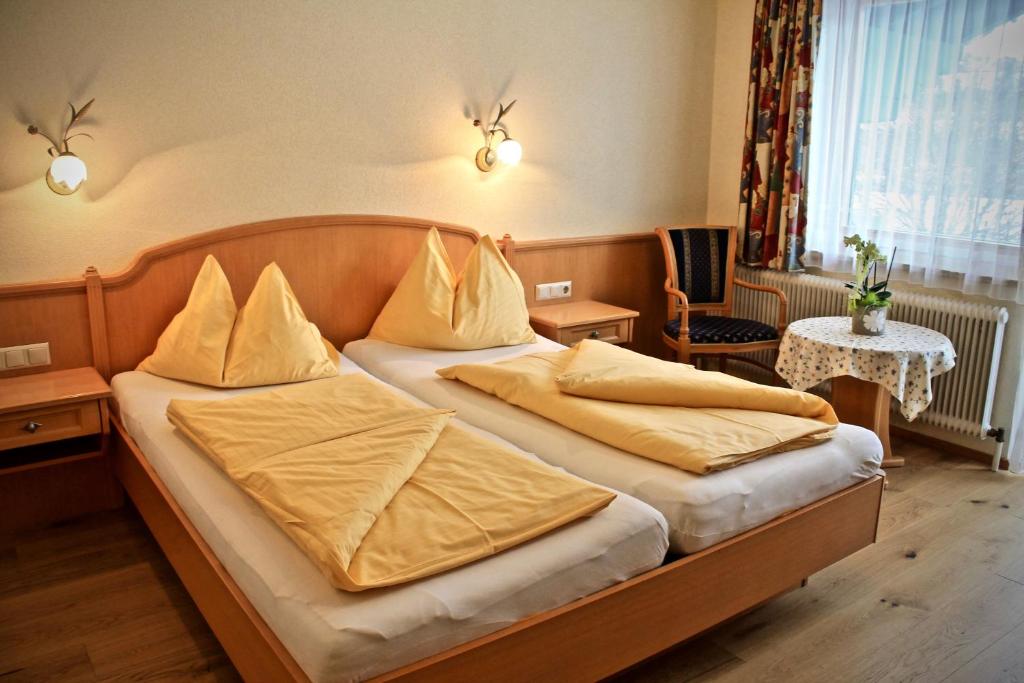 Postel nebo postele na pokoji v ubytování Hotel Druschhof